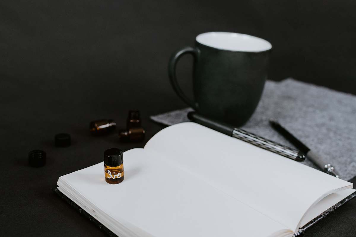 coffee cup white page of book grey